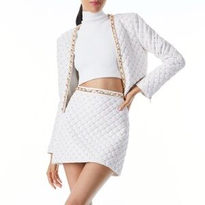 RILEY QUILTED VEGAN LEATHER STUD MINI SKIRT